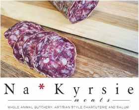 Na*Kyrsie Meats Cacciatore Salami sliced to show texture